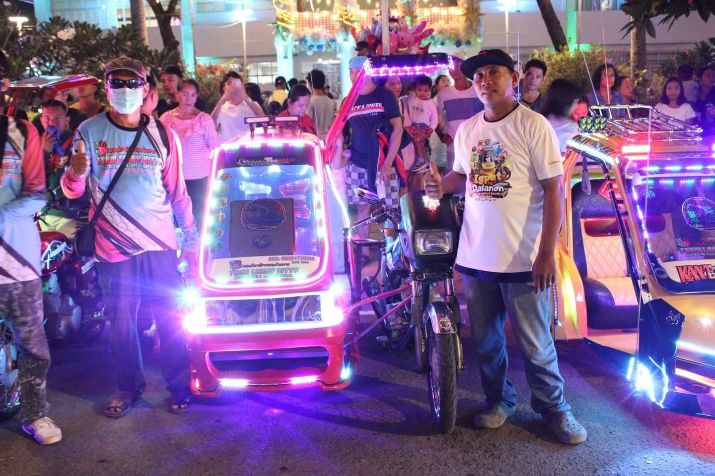 A tricycle lit with colored lights at the Igpat sa Dalanon competition during Sinadya 2024